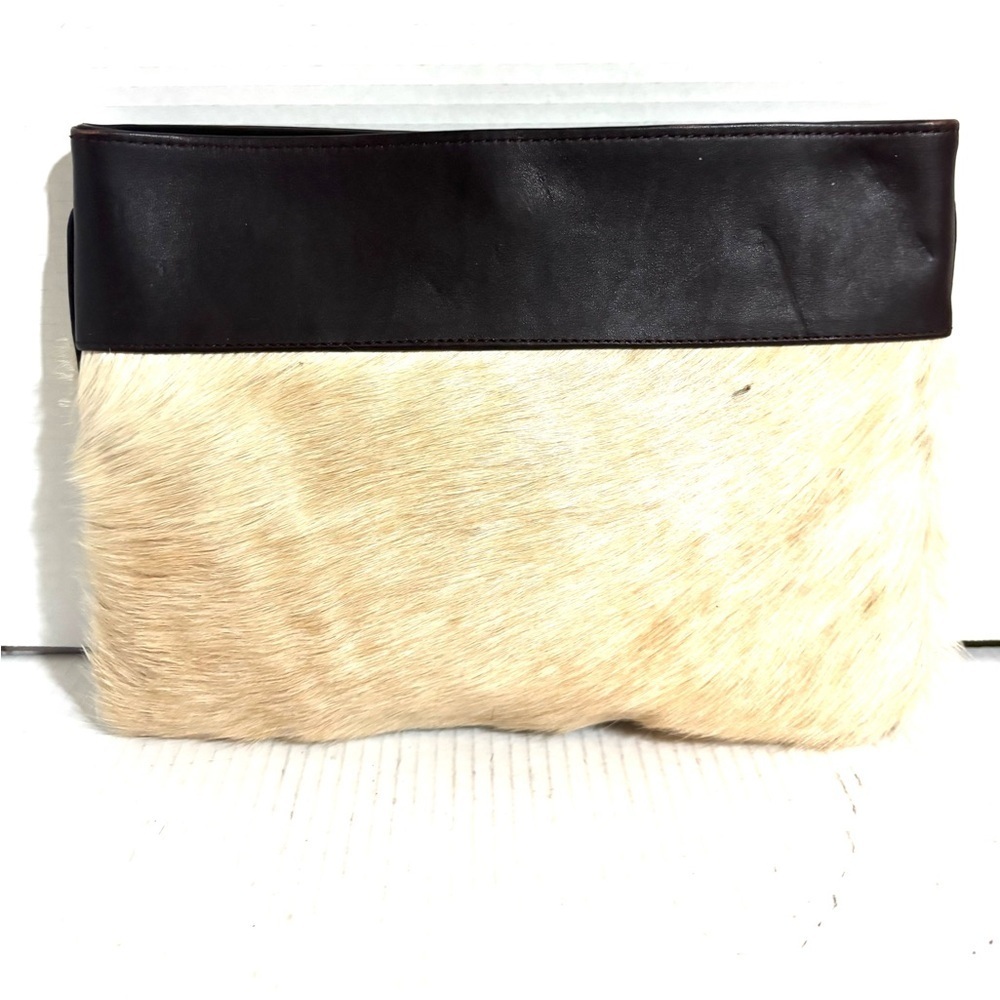 Handmade Elegant Black and Cream cowhide clutch
